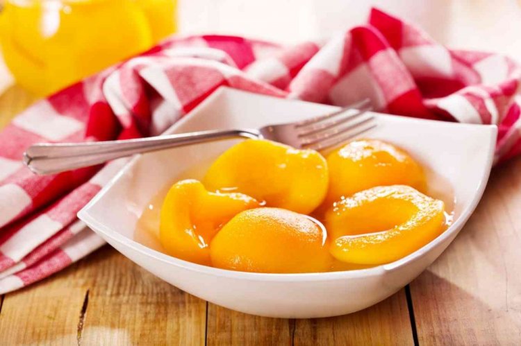 Персики половинками в сиропе