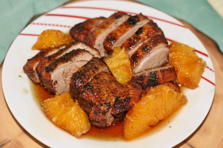 Запеченная свинина с апельсинами в духовке