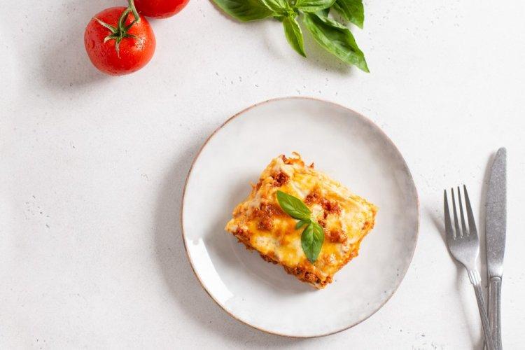 Запеканка из лепешек роти с курицей под сыром