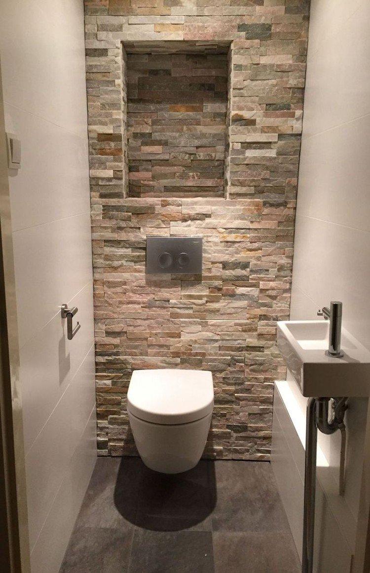 Декоративный камень - отделка стен в туалете