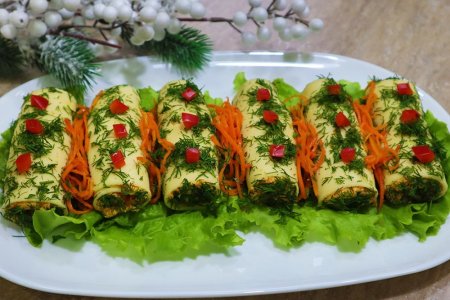 Рулетики из сыра с корейской морковью Рулетики из сыра с корейской морковью