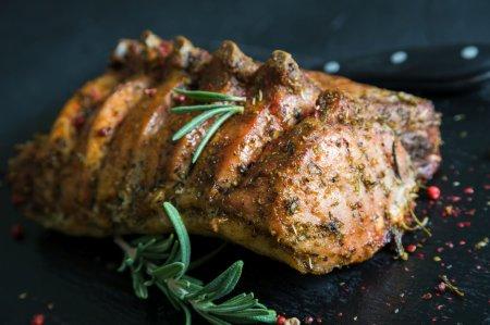 Свиная корейка на кости, запеченная в духовке – вкуснейший рецепт