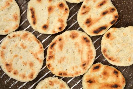 Сметанные лепешки без дрожжей в духовке – рецепт пошагово