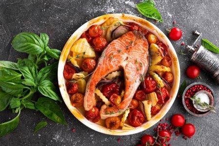 Стейки форели с картошкой и овощами в духовке