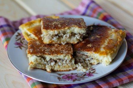 Заливной пирог с сайрой и рисом на молоке – сытный и вкусный рецепт