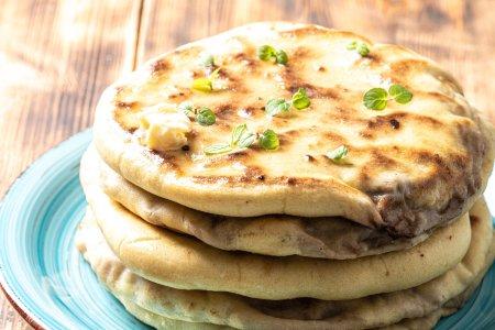 Хычины с сыром и картошкой на сковороде