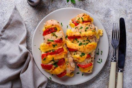 Куриные грудки с помидорами и сыром в духовке
